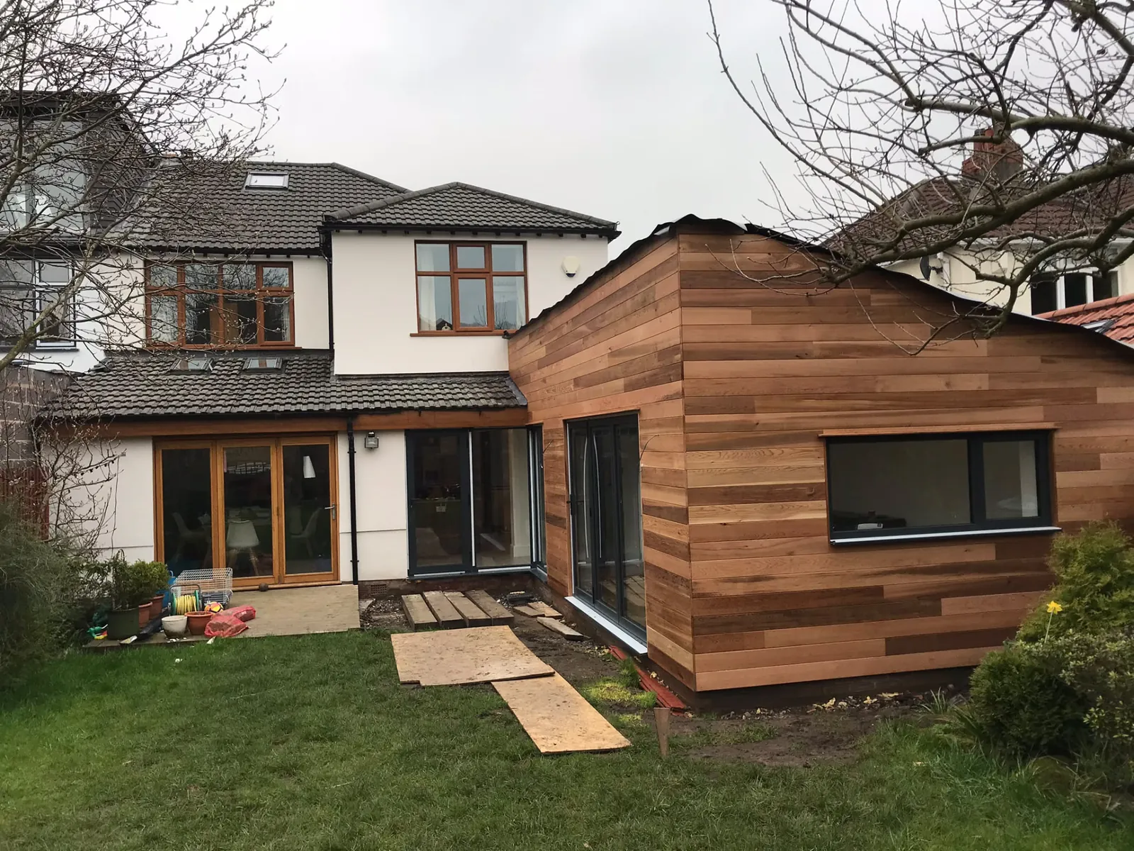 Timber-clad rear extension nearing completion