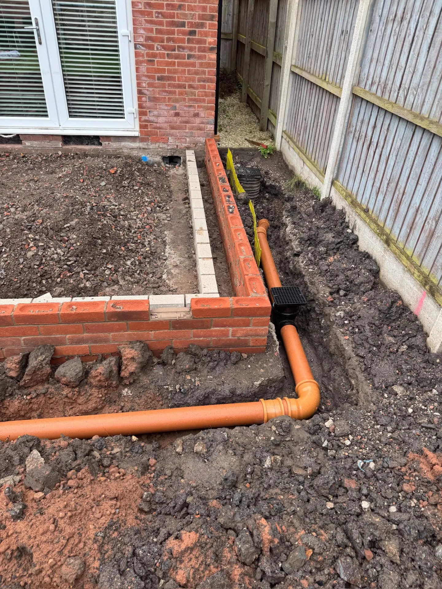 Extension foundations and brickwork with new underground drainage pipework